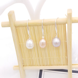 Detailed view of S925 silver hook earrings featuring white, pink, and purple freshwater pearls