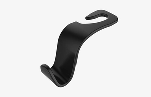 Close-up of a sleek black S-shaped universal car seat back hook for organization