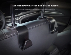Detail view of durable black U-shaped car seat hooks made from high-impact PP material