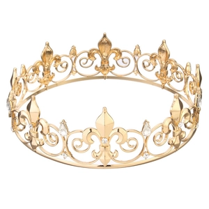 Macro shot of gold wedding crown showing detailed fleur-de-lis pattern and crystals