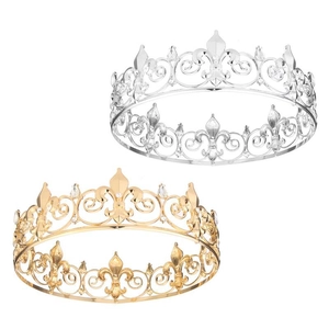 Close-up of gold and silver alloy bridal crowns featuring intricate hollow patterns and crystals