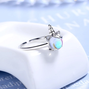 Minimalist silver unicorn open ring featuring a magical iridescent moonstone gemstone