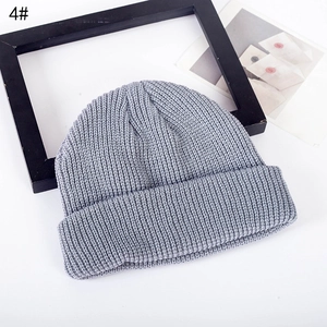Classic grey knitted beanie hat with cuffed brim for women, winter fashion style