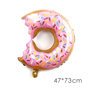 Detail of pink donut foil balloon with colorful sprinkles, measuring 47x73cm for birthday decor
