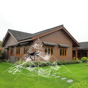 Giant white triangular spider web and large black spider for outdoor Halloween decoration