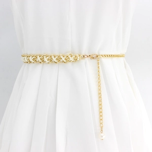 Detail of adjustable gold metal chain waist belt with elegant white faux pearl accents