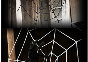 Detail of giant spider web decoration in black and white colors for Halloween party setup