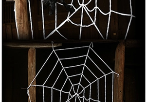Detail of giant white spider web on dark wooden beams for Halloween party decor