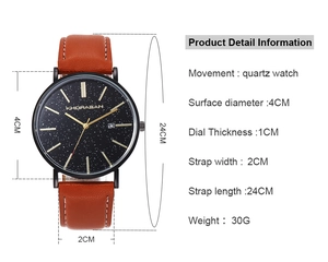 Detail view of quartz watch featuring black star pattern dial and brown leather strap