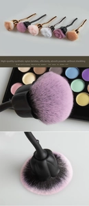 Close-up of rose shaped makeup brushes with dense nylon bristles for powder and blush