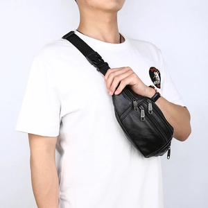 Men's waterproof black leather waist bag with multi-layer zippers and adjustable strap