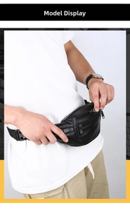 Detail of waterproof black leather waist bag with adjustable strap and multiple zip pockets