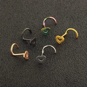 Five hollow heart-shaped stainless steel L-shaped nose studs in multiple metallic finishes