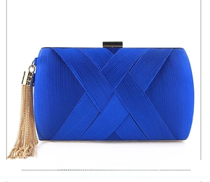 Royal blue satin evening clutch bag featuring elegant pleats and gold tassel detail