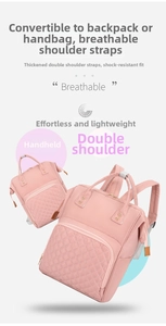 Detail of pink quilted nylon diaper bag with breathable straps and dual carry handles