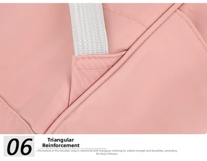 Detail showing the reinforced triangular stitching on pink nylon mommy bag straps