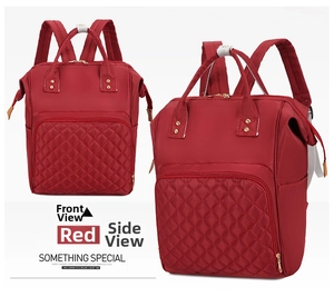 Front and side views of red nylon diaper bag with diamond quilted pattern and gold zippers
