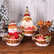 Three festive Christmas candy baskets featuring Santa, Snowman and Reindeer designs