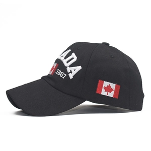 Black cotton baseball cap with white CANADA 1867 embroidery and Canadian flag patch