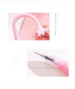 Macro detail of pink cherry blossom silicone pen with soft grip and transparent nib structure