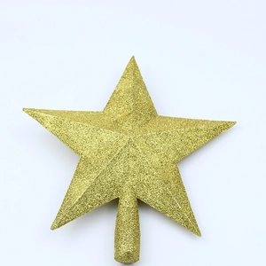 Close-up of glittery gold star tree topper with specialized mounting base for Christmas trees