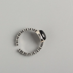 Vintage S925 sterling silver open ring with oval black onyx and textured silver band