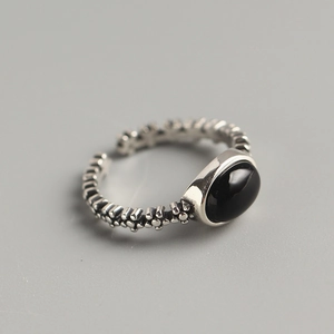 Retro S925 sterling silver open ring with oval black onyx and textured star-line band