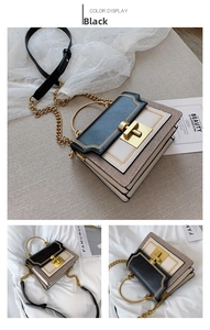 Detail of color-blocked crossbody bag with gold metal handle and woven texture
