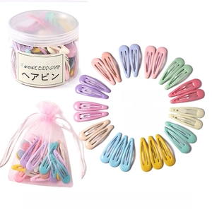 Set of 26 candy-colored BB hair clips in a storage jar with a pink drawstring bag