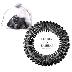 Set of black metal snap hair clips with a white organza drawstring storage pouch