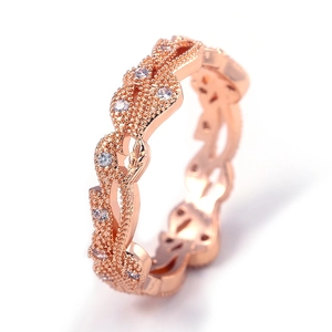 Vintage roségouden ring met micro-pave zirkoon en verfijnde gevlochten bladmotieven