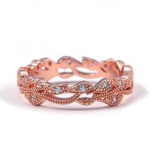 Vintage roségouden ring in bladvorm met kristallen en elegante milgrain details