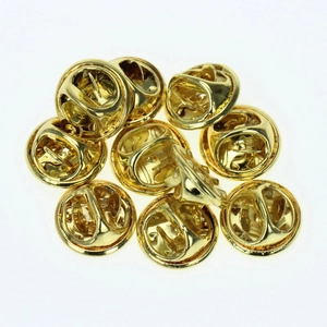 Golden butterfly clutch metal pin backs set for badges and brooches on white background