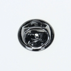 Macro detail of black metal butterfly clutch pin backs for securing badges and brooches