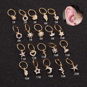 Venti tipi di orecchini per cartilagine in acciaio dorato con pendenti in zirconia