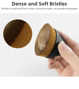 Macro shot of dense brown synthetic bristles on a flat-top magic foundation brush