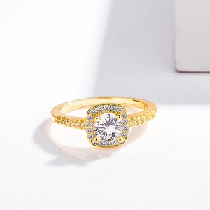 Detailed close-up of a gold-plated square zircon ring with sparkling side stones