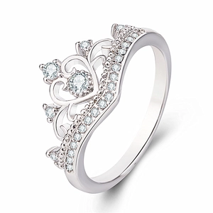 Detailed 45-degree angle of a silver crown ring with sparkling cubic zirconia stones