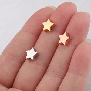 Polished stainless steel star charms in gold, silver, and rose gold for DIY jewelry making