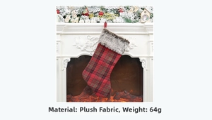 Detail of red and black plaid Christmas stocking made of plush fabric on a white mantel