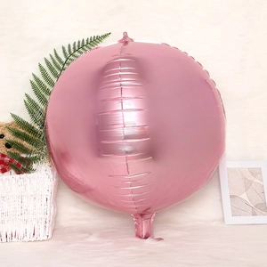 Detail of 4D round pearl pink aluminum foil balloon with a shiny metallic finish