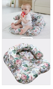 Macro shot of infant support sofa cushion with vintage floral pattern and soft fabric