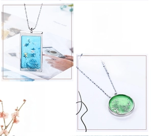Detail of DIY resin necklace pendants with geometric metal frames and glitter inlay