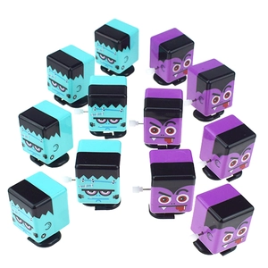 Detailed top view of group wind-up Frankenstein and vampire walking toys for Halloween