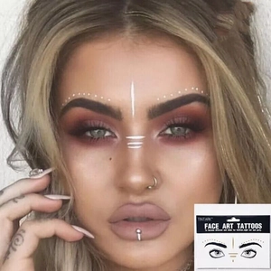 Face art tattoos with white geometric patterns for forehead and eye makeup decoration