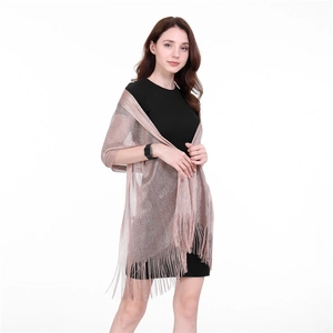 Elegant rose gold evening shawl with fringe tassels and metallic luster for women