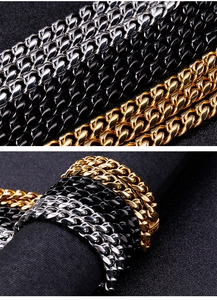 Close-up of hip hop Cuban link chains in gold, silver, and black polished steel