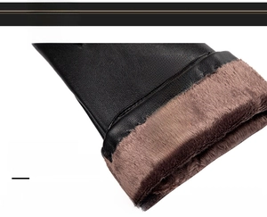 Detail view of winter leather gloves showing thick brown faux fur lining for warmth