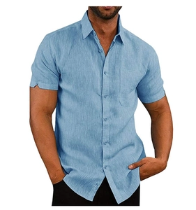 Detail view of the men's light blue cotton linen shirt with classic collar and chest pocket