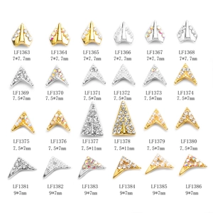 3D geometric alloy nail art charms with sparkling rhinestones and pearls in a grid display